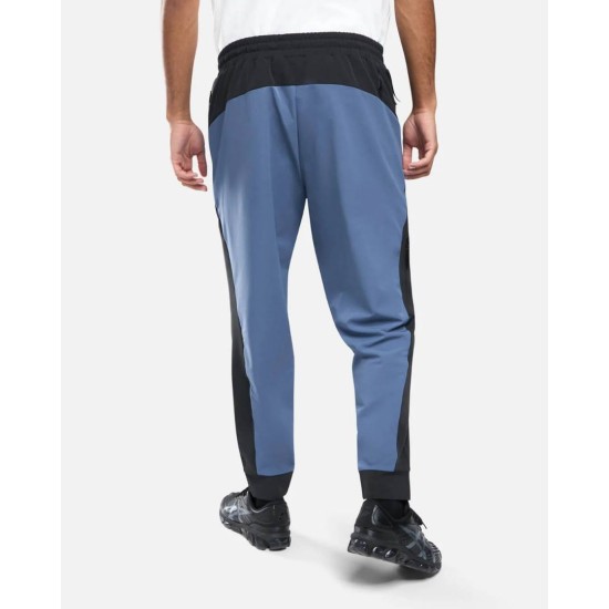PUMA TECH WOVEN PANTS 680311 55 ΜΠΛΕ ΜΑΥΡΟ
